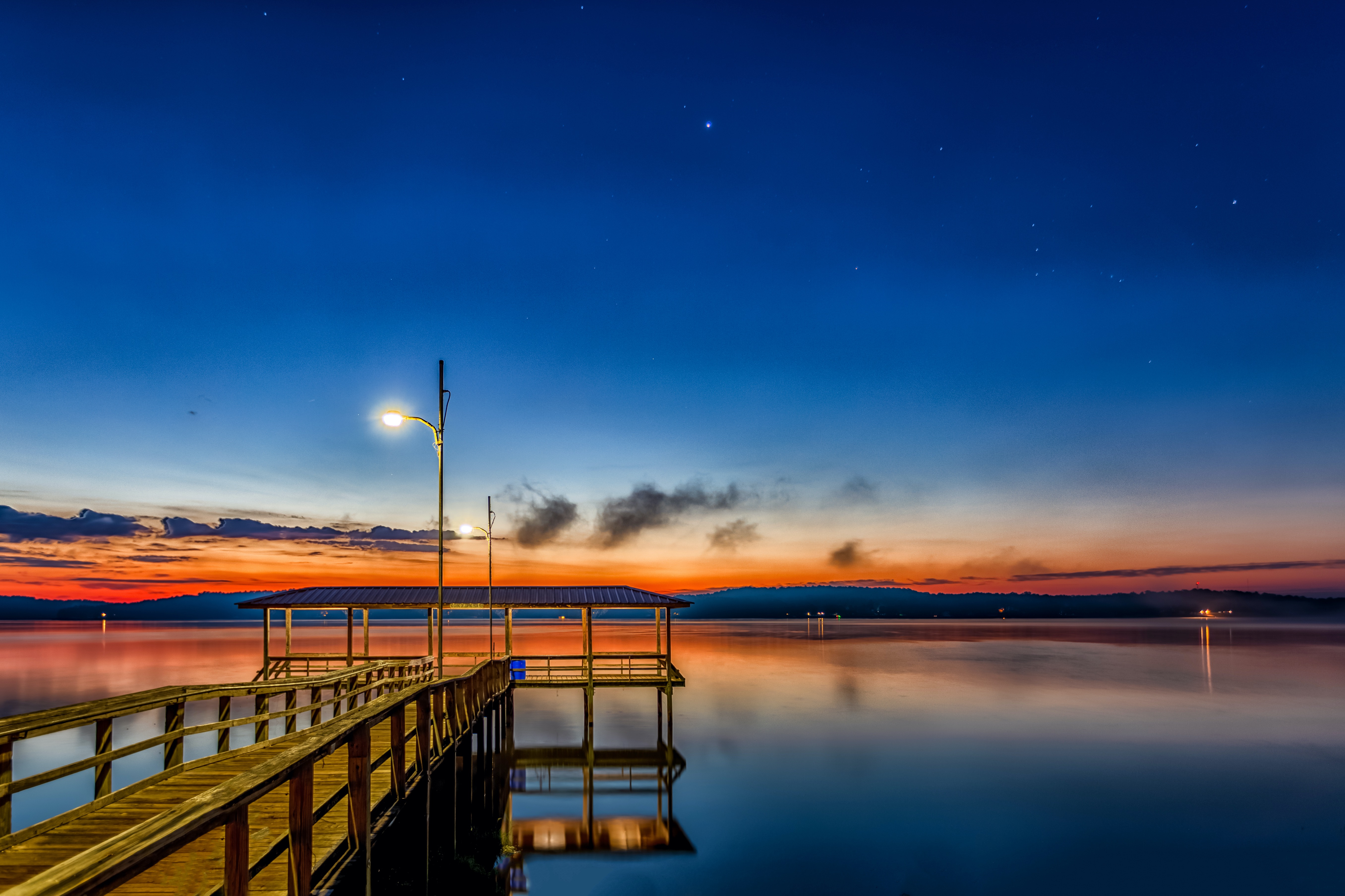 Photo of a dock on lake Nacogdoches during sunset